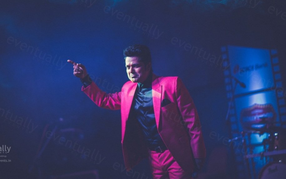 Navin Prabhakar performing at a corporate event